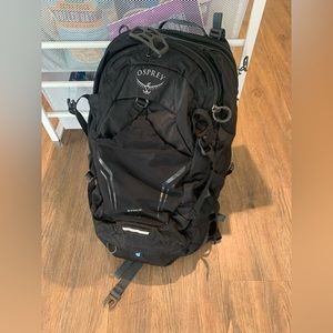 Never used Osprey travel weatherproof backpack
